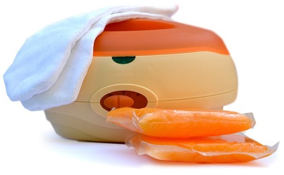 พาราฟินอาบน้ำสำหรับมือและเท้า ประโยชน์คำแนะนำสำหรับใช้ที่บ้านสูตรสำหรับการแต่งเพลง